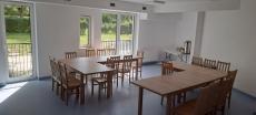 Powiększ zdjęcie: sala-aktywnosci-dziennej-i-jadalnia-w-klubie-seniora.jpg
