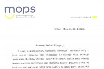 Zdjęcie przedstawia pismo z-cy dyrektora Miejskiego Ośrodka Pomocy Społecznej w Bielsku-Białej Pani Małgorzaty Polak, zawierające życzenia świąteczne dla rodzin zastępczych